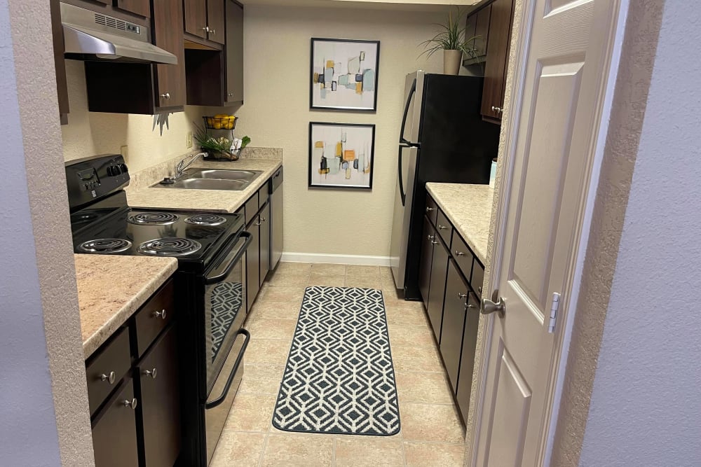 Modern kitchen and appliances at The Abbey at Jones Road in Houston, Texas