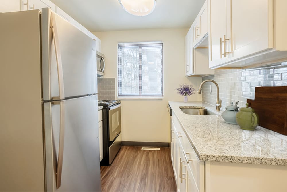 Galley kitchen at High Acres Apartments & Townhomes in Syracuse, New York