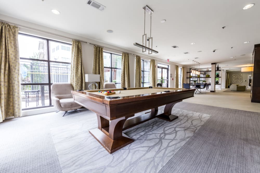 Pool table in large area of community clubhouse at Marq Eight in Atlanta, Georgia