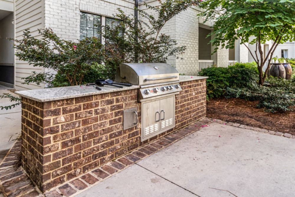 Stainless steel BBQ in brick with granite countertop at Marquis at Buckhead in Atlanta, Georgia