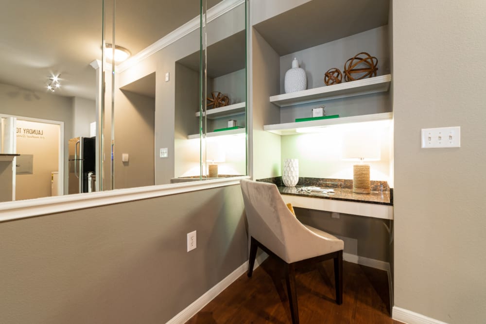 Built-in workstation area with shelves at Marquis at Texas Street in Dallas, Texas