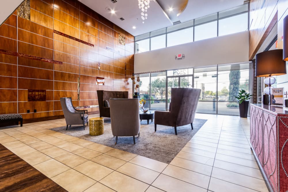Lobby entrance with couches and seating chairs at The Marq on Voss in Houston, Texas