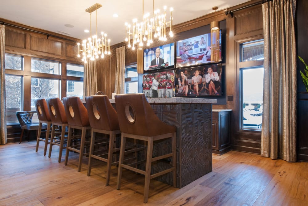 Clubhouse bar seating for residents at Clifton Park Apartment Homes in New Albany, Ohio