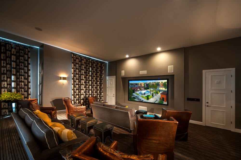 Movie theater with comfortable seating at Palmer House Apartment Homes in New Albany, Ohio
