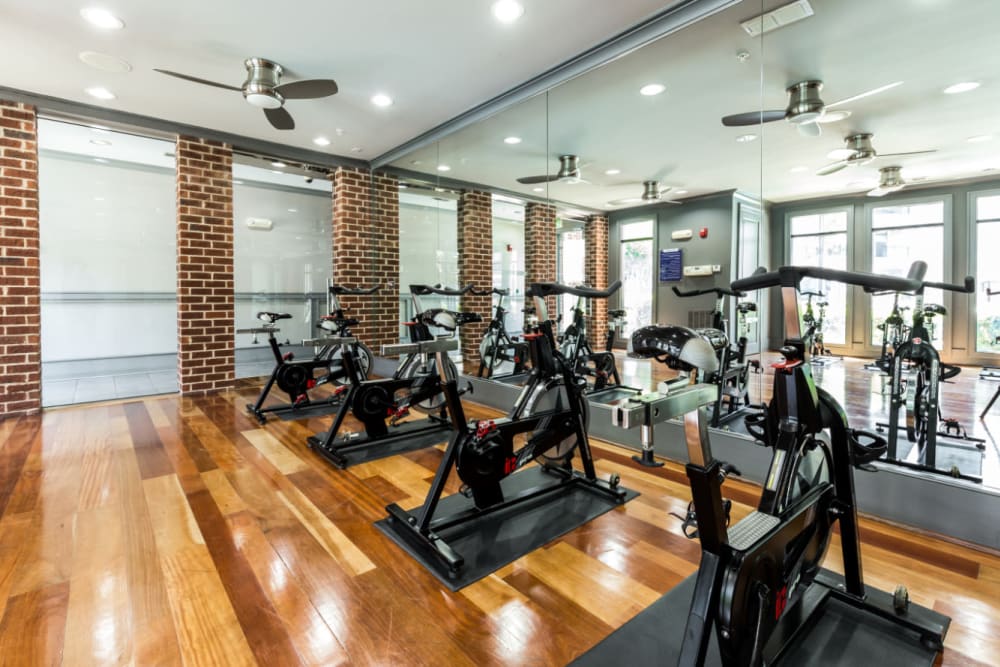Spin cycles facing mirrors at Marquis Midtown District in Atlanta, Georgia