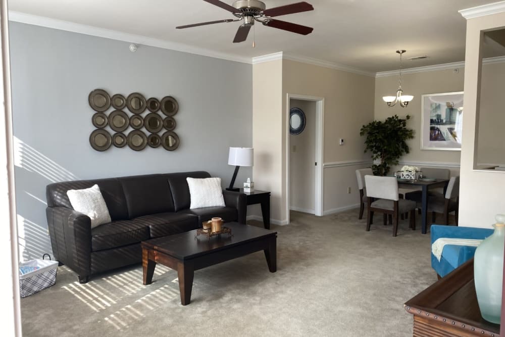 Comfortable and modern furnishings in a living room at Aspen Pines Apartment Homes in Wilder, Kentucky