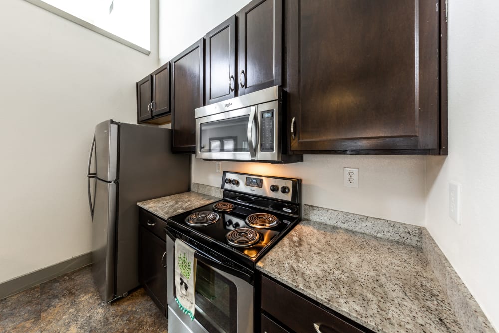 Kitchen with stainless steel appliances at Regents West at 26th in Austin, Texas