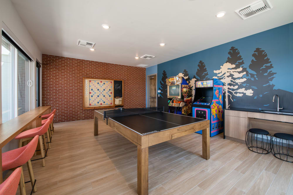 Game room with ping pong at Marq Iliff Station in Aurora, Colorado