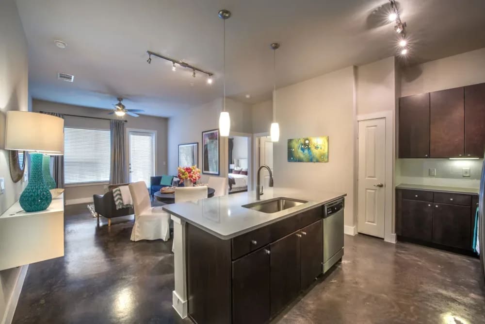 Spacious kitchen with big island with lots of extra counter space at Macallan at Ross in Dallas, Texas