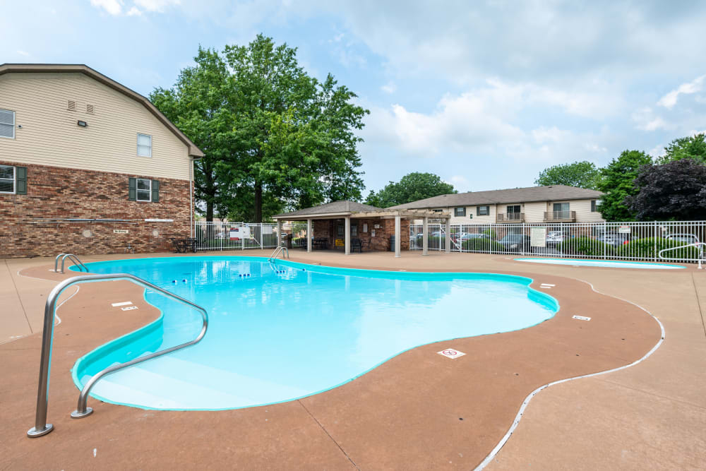 Beautiful swimming pool at Village Green Apartments in Evansville, IN