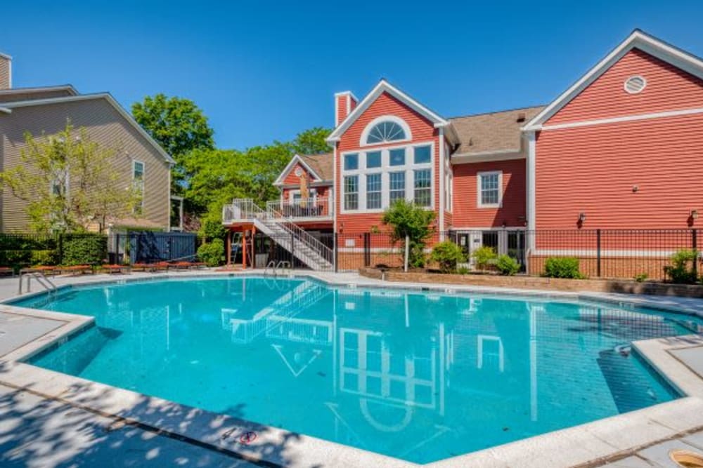 Refreshing swimming pool at Abbotts Run Apartments in Alexandria, Virginia