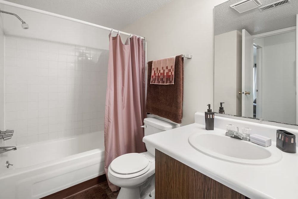 Bathroom in a home at Arbors of Battle Creek Apartments & Townhomes in Battle Creek, Michigan