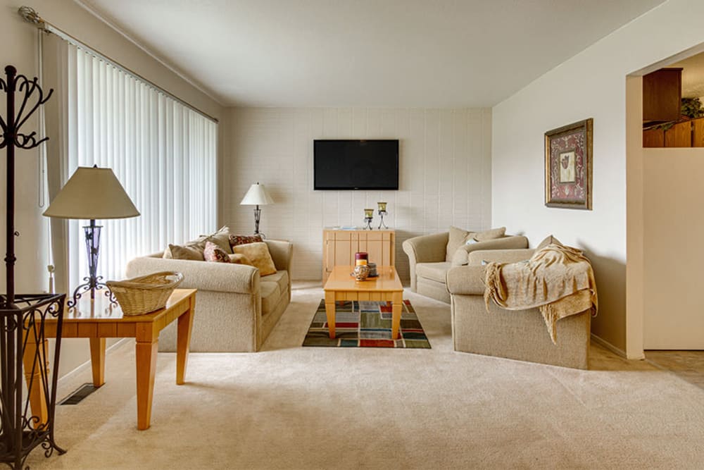 A living room in a home at Briarcliffe Apartments & Townhomes in Lansing, Michigan