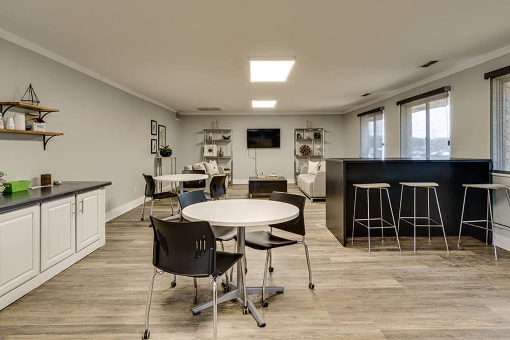 Resident lounge with seating at Briarcliffe Apartments & Townhomes in Lansing, Michigan