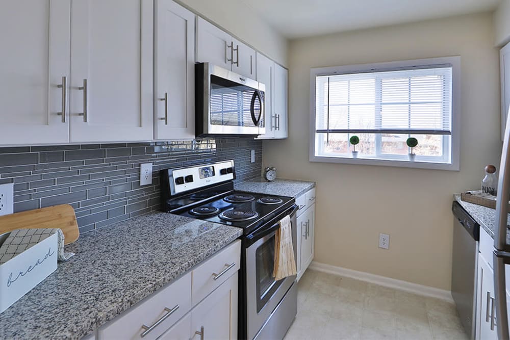 Modern kitchen at Elmwood Terrace Apartments & Townhomes in Rochester, New York