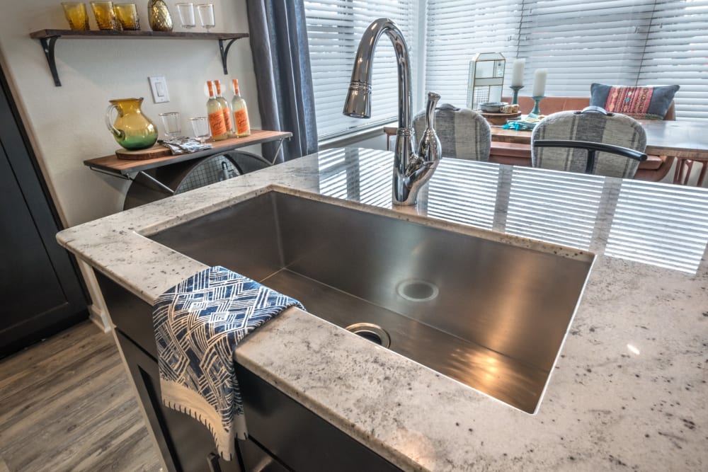 Stainless steel sink in the kitchen at Mercantile River District in Fort Worth, Texas