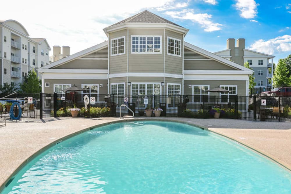 Swimming pool in front of clubhouse at Sofi Danvers in Danvers, Massachusetts