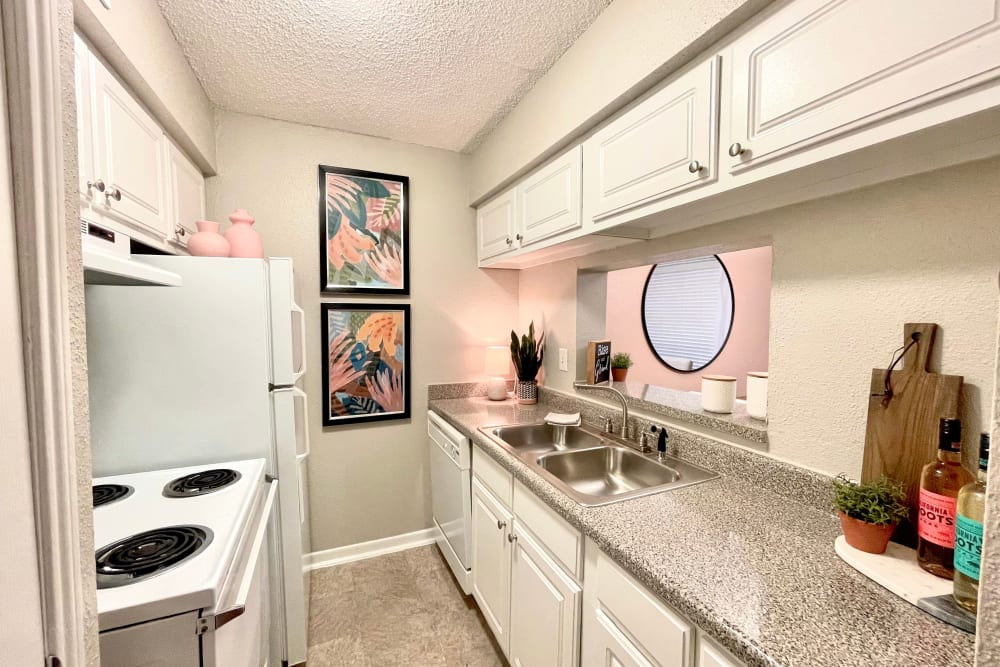 Kitchen in an apartment at The Abbey at Briargrove Park in Houston, Texas