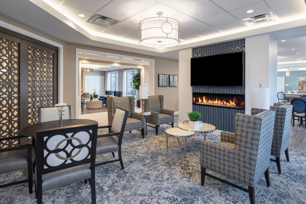 Lounge with gas fireplace at Blossom Springs in Oakland Twp, Michigan
