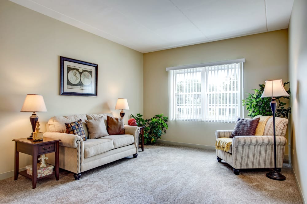 Furnished senior apartment living room at Hanover Place in Tinley Park, Illinois