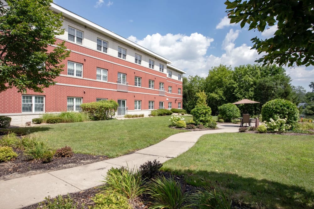 Paved walking path encircling the community at Hanover Place in Tinley Park, Illinois