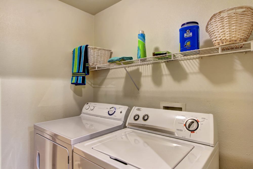 In unit washer and dryer at Marquis at The Woodlands in Spring, Texas