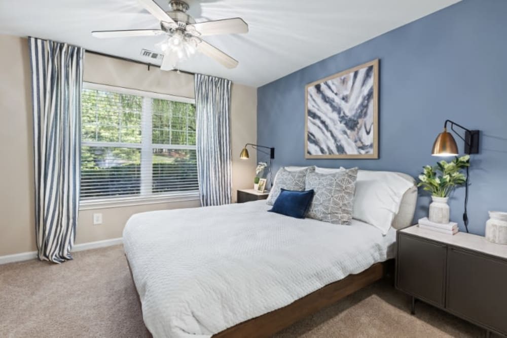 Well lit bedroom in unit at Marquis on Cary Parkway