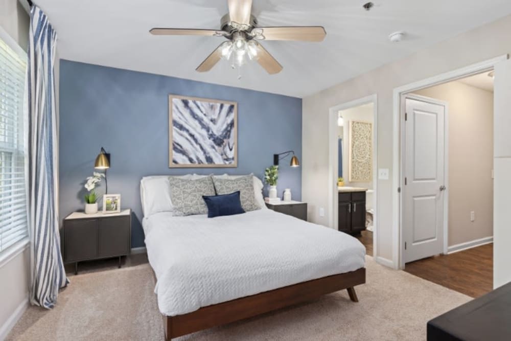 Well decorated main bedroom in unit at Marquis on Cary Parkway