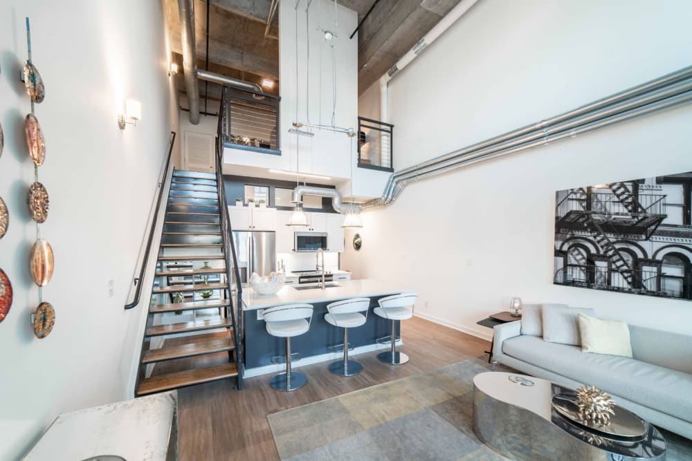 Open-design model loft apartment home with modern furnishings at 17th Street Lofts in Atlanta, Georgia