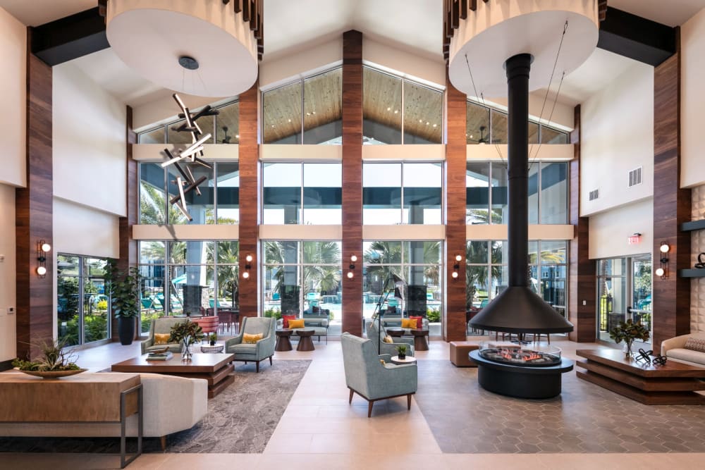 Lounge with vaulted ceilings at Integra Crossings in Sanford, Florida