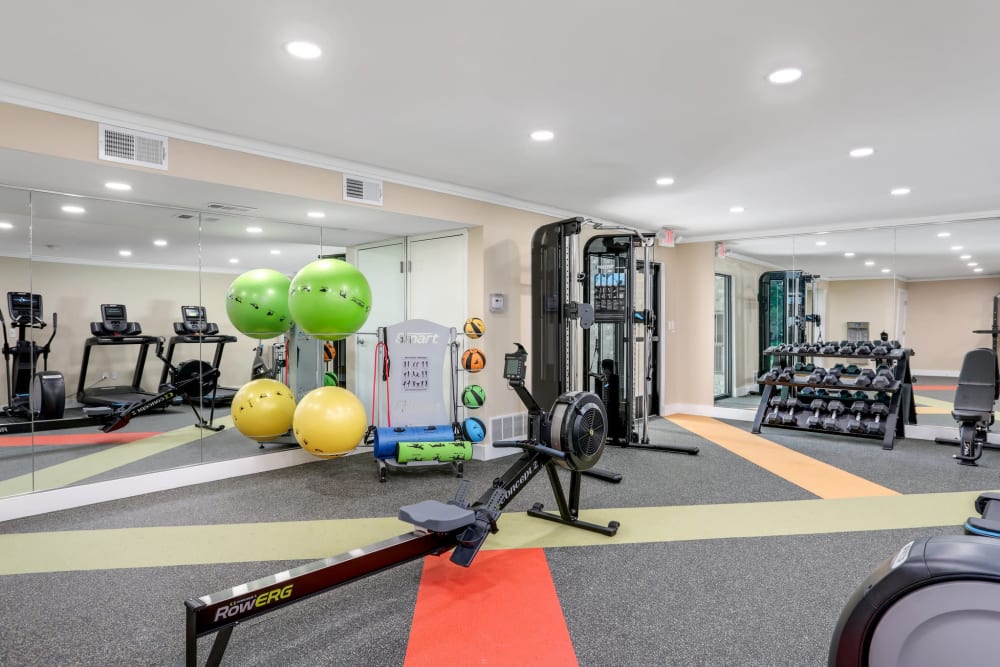 State-of-the-art fitness center with crosstraining equipment at Farmington Oaks Apartments in Farmington, Michigan