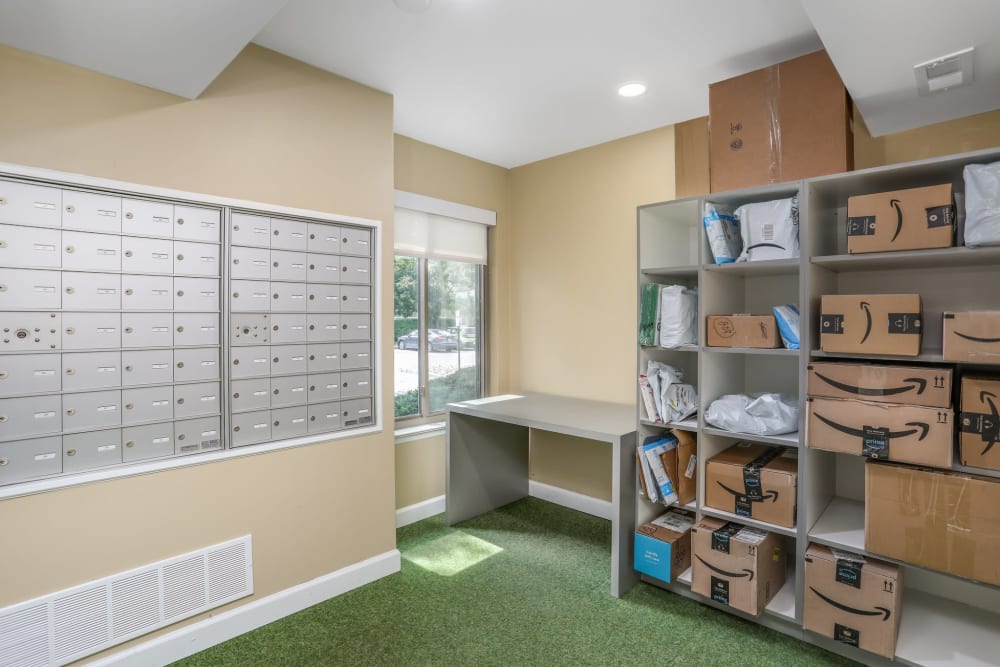 Mail room and package storage at Farmington Oaks Apartments in Farmington, Michigan