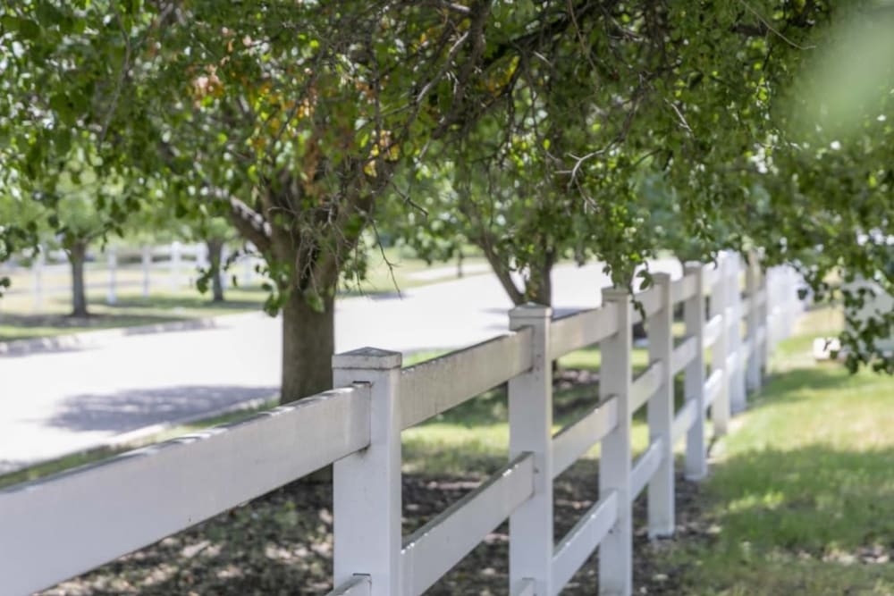 Pastoral white fencing at Meadow Creek Senior Living in Lancaster, Texas