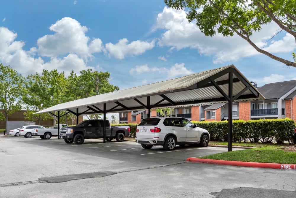 Covered parking spaces for residents at Foundations at Austin Colony in Sugar Land, Texas