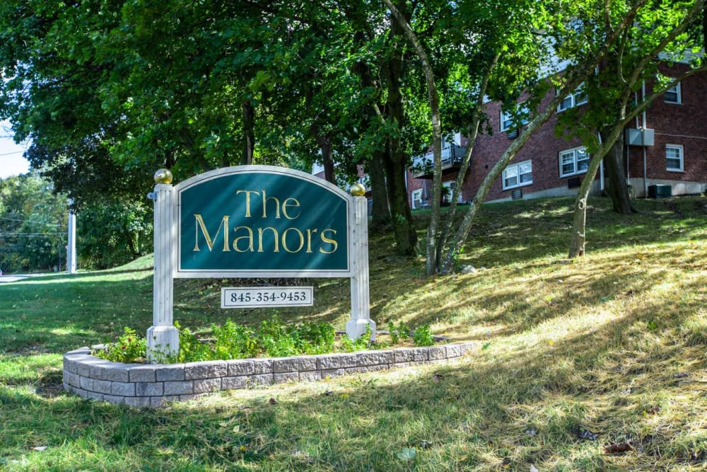 Sign outside the entrance to The Manors in Pomona, New York