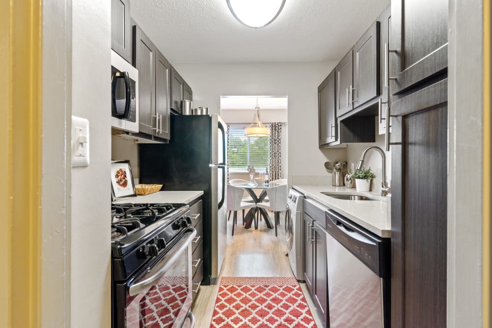 A large kitchen with plenty of countertop space at Goldelm at 414 Flats in Knoxville, Tennessee