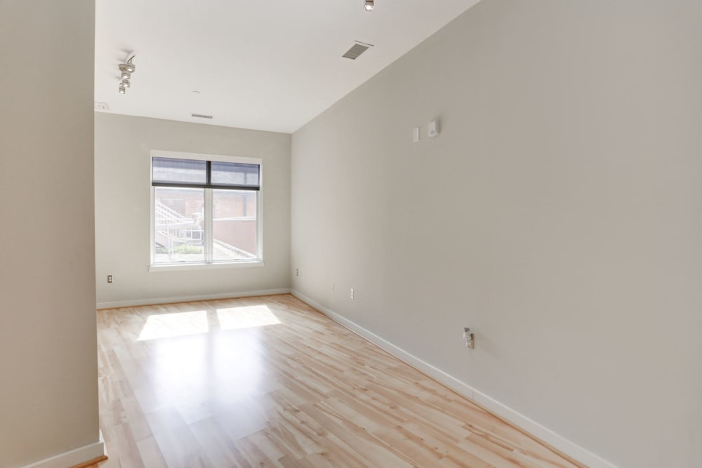Spacious and bright living room area in an empty home at 1350 Florida in Washington, District of Columbia