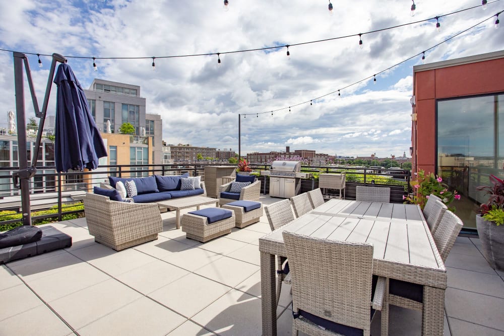 Large lounge area where friends can relax and enjoy a nice clear day at 1350 Florida in Washington, District of Columbia