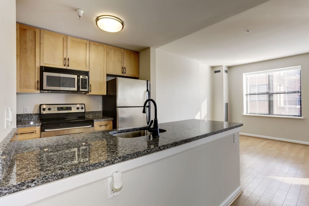 Large island in the kitchen area making tons of counter space at 1630 R St NW in Washington, District of Columbia