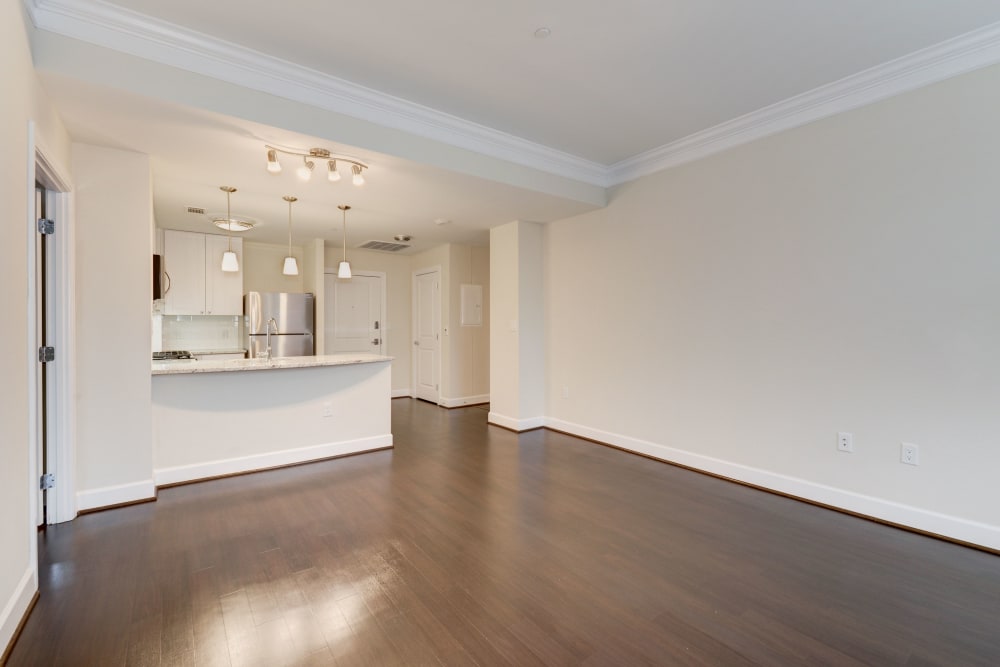 Open concept living area with dark wood style flooring at 700 Constitution in Washington, District of Columbia