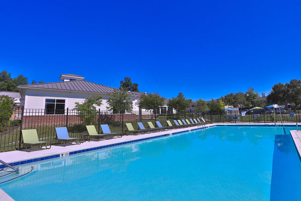 Swimming pool and lounge chairs at The Townhomes at Diamond Ridge in Baltimore, Maryland