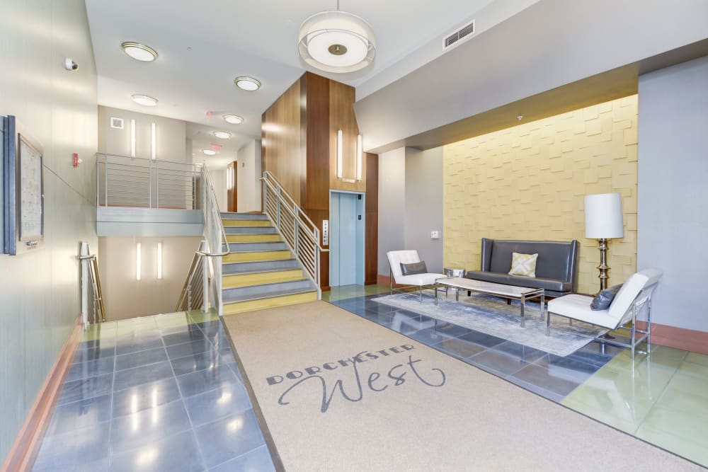 Sleek and modern looking lobby with seating for residents to hang out in at Dorchester West in Washington, District of Columbia