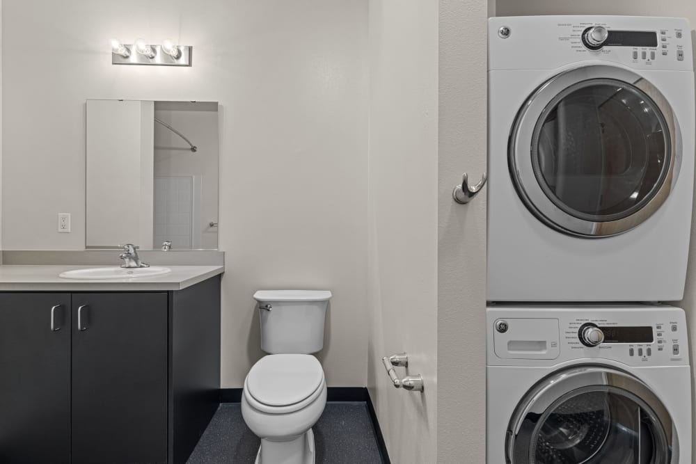 Bathroom with washer and dryer at Anthem on 12th in Seattle, Washington