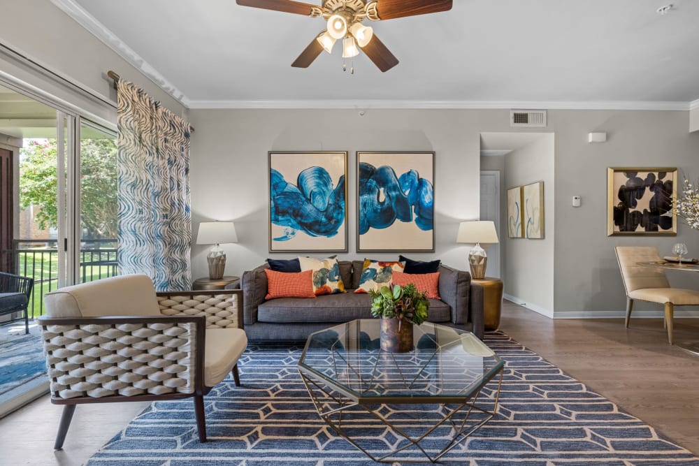 Living room with wood style floors at Brooks on Preston in Plano, Texas
