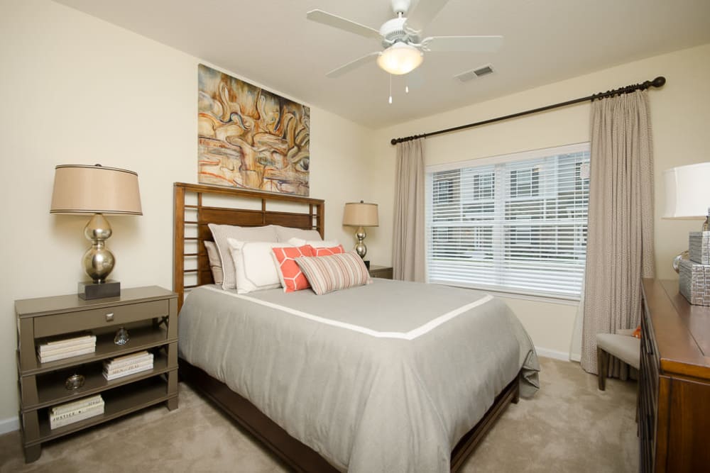 Nice ceiling fan in the bedroom to help keep the area cool at The Retreat at Market Square in Frederick, Maryland