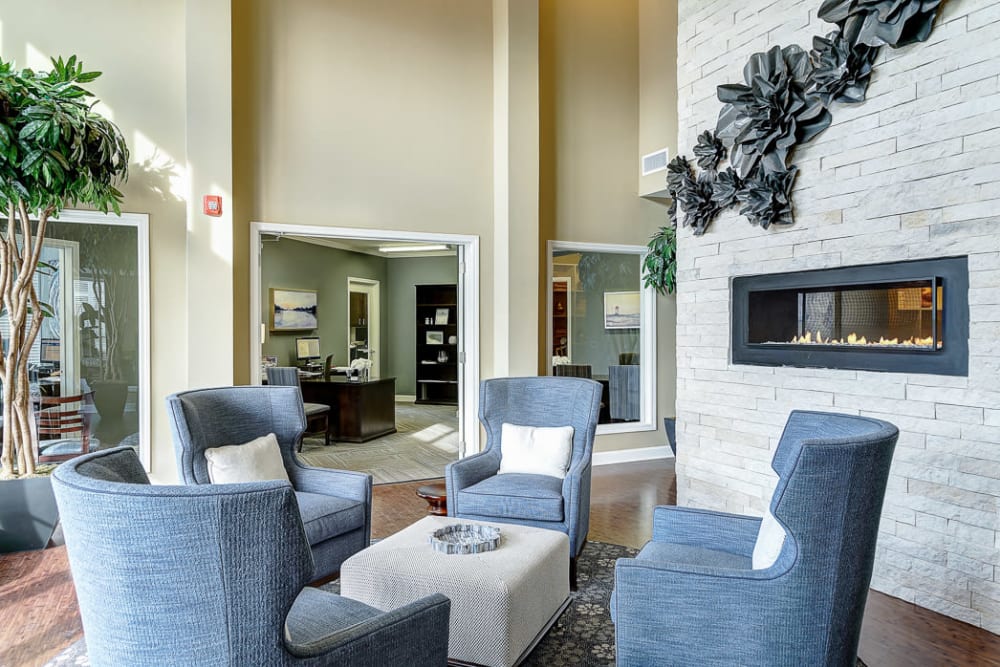 Clubhouse area with some comfy chairs where residents can relax in at The Retreat at Market Square in Frederick, Maryland