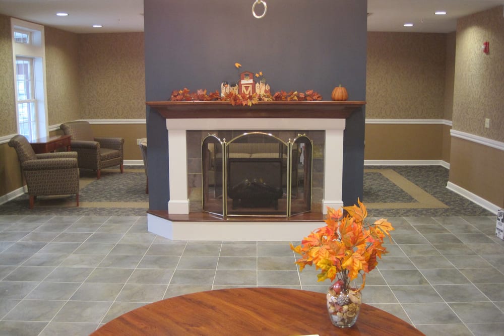Sitting area and fireplace at Windsor Estates Assisted Living in New Middletown, Ohio