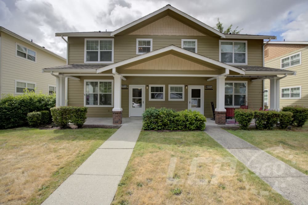 Front yard and exterior view of a home at Beachwood South in Joint Base Lewis McChord, Washington