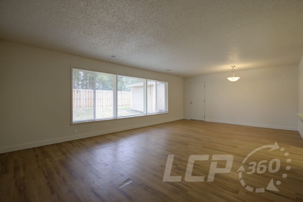 Spacious open living area in a home at Beachwood South in Joint Base Lewis McChord, Washington