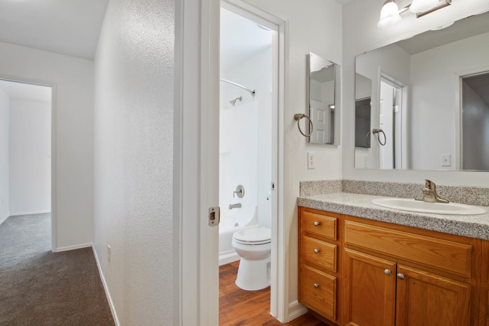 View of bathroom with entryway to toilet and shower area in a home at Pacific View in Oceanside, California